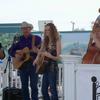 Photo of the Generation Blue Grass Band performing on stage.