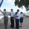 Pilot Carl Saunders goes over Pre-Fight inspection of plane and how everything works with his group