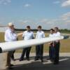 Pilot Mike Wilkerson goes over Pre-Fight inspection of plane and how everything works with his group