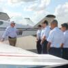 Pilot Mike Wilkerson goes over Pre-Fight inspection of plane and how everything works with his group