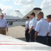 Pilot Mike Wilkerson goes over Pre-Fight inspection of plane and how everything works with his group
