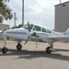 Everyones onboard Carls twin engine plane ready to start the engines.