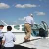Pilot Mike Wilkerson boards his plane