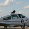 Sue Birge boarding Carls twin engine plane