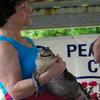 I don't think that's a gator purse in her hands.