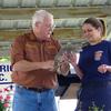 Tim Williams: Gatorland's gator expert giving a lizard to one of Hardee County Fire Fighter