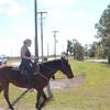 Cindy Walker  riding back across State Road 663 
