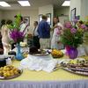 Assortment of desserts from the Florida Hospital Wauchula Dietary Department. Flower Arrangements from Cooper's Wayside Flowers