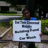 Tayquan holding sign on US 17 South