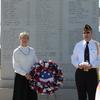 Sandy Scott and Post Commander Joe Filice in front of vetrans memorial 