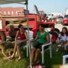 Rachel Chapa Director of Lydia's House Wauchula, Fl. and girls from Lydia's House at their petting zoo booth