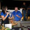 Alan Jay Automotive Network Business Manager Sonia Deemer with Business Manager Mr. Spurlock as he reads out the winning numbers with Sonia