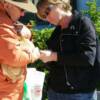 Dr. Hendry and Tammy giving Peaches her shots
