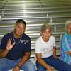 Jessie , Gabriel, and Maria Mendoza all having a good time at the rodeo.