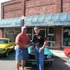 In front of classic Mustang on Main Street 